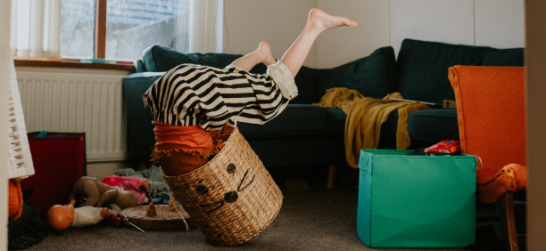 Child plays in basket