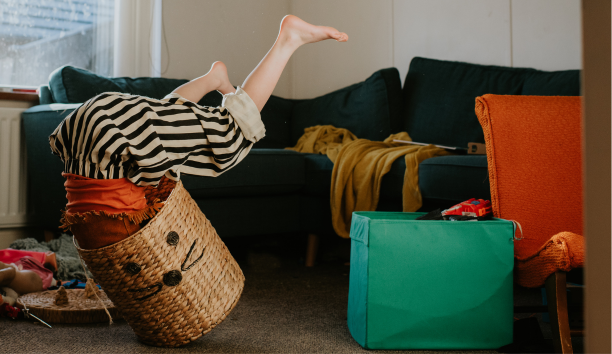 Child plays in basket