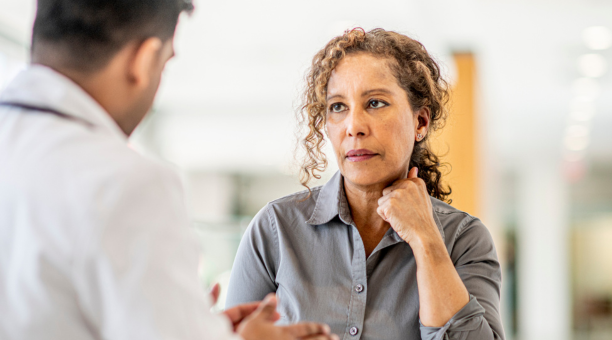 Woman speaks to professional