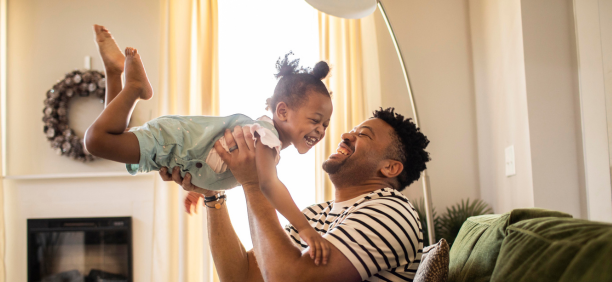 Dad plays with daughter