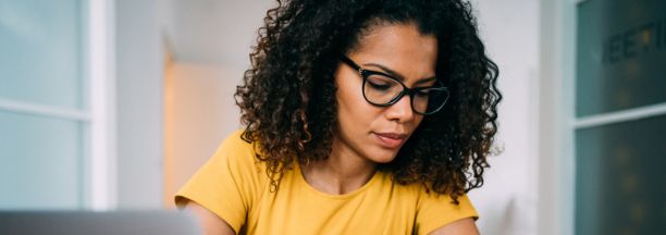 Woman goes through checklist at work