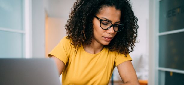 Woman goes through checklist at work