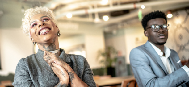 Two employees celebrate