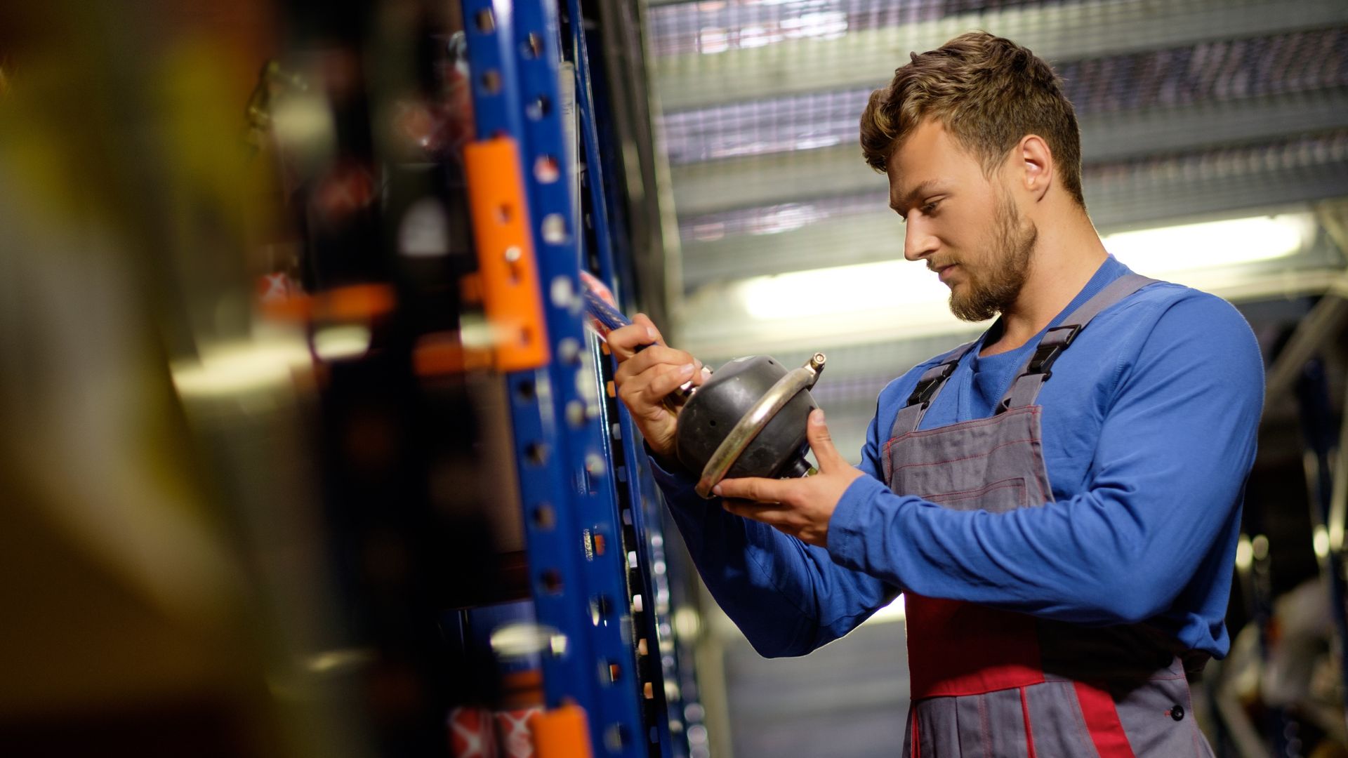 Automotive worker with equipment