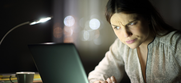 Woman look confused at screen